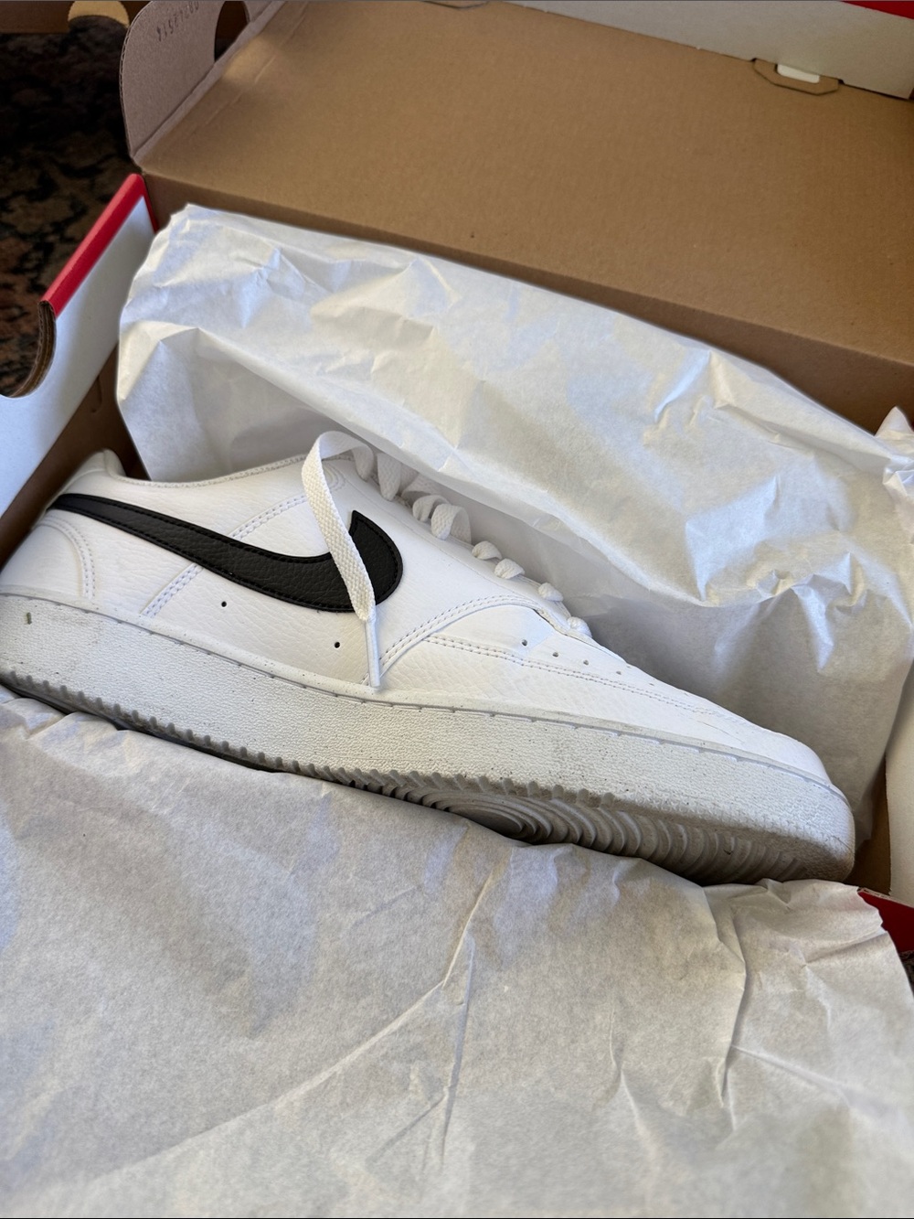 Nike Men’s White Low-Top Sneakers with Black Swoosh Accent